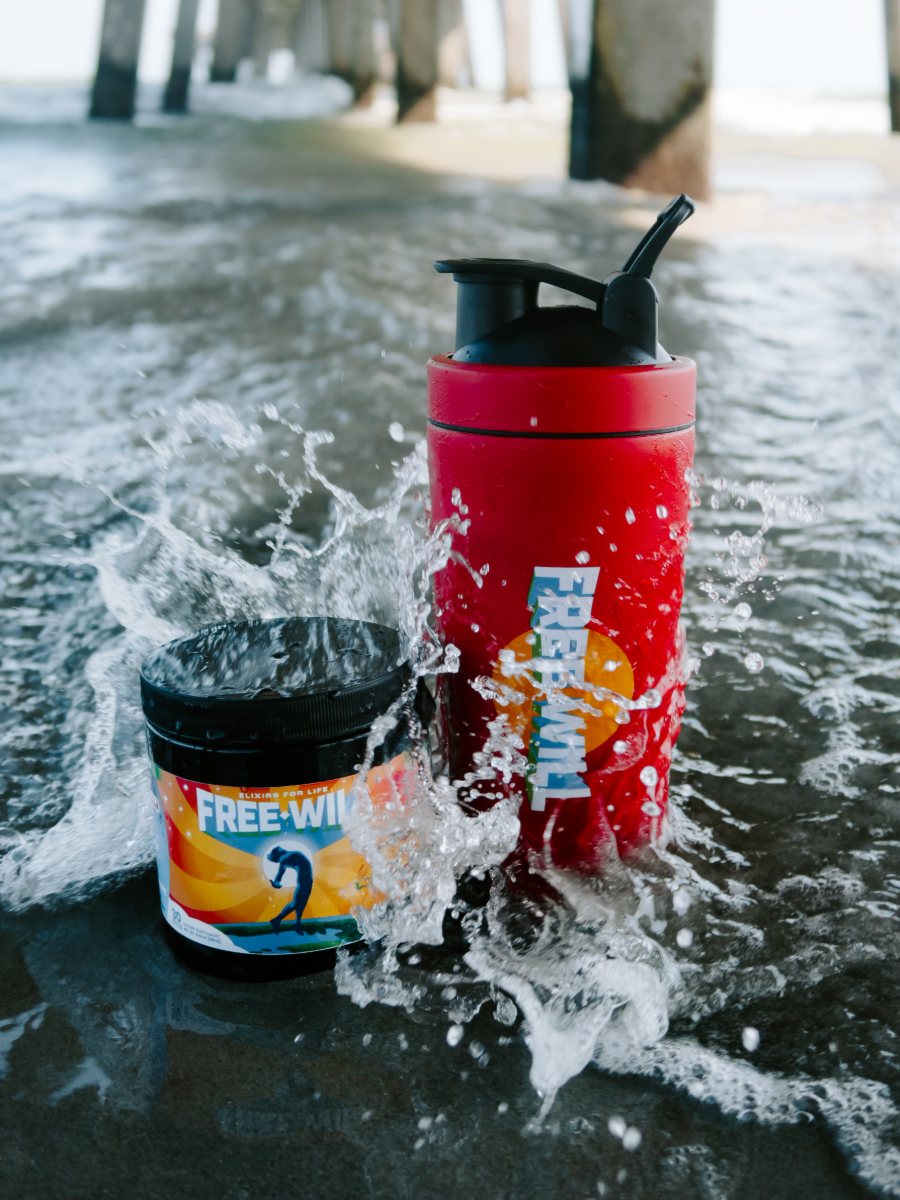 Free Will tub and shaker in the surf under the pier