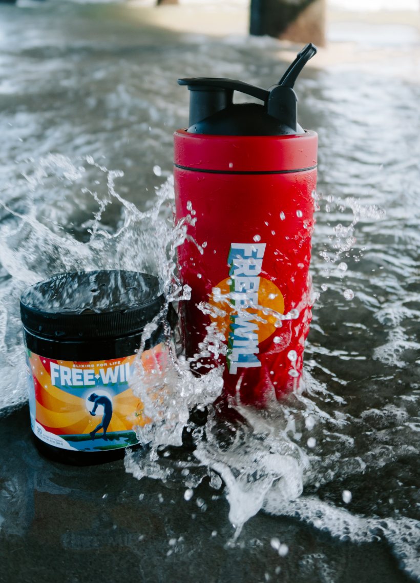 Free Will tub and shaker in the surf under the pier